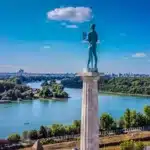 MBBS in Serbia - a statue of a man standing on top of a tower